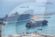 The Container Ship Zim Luanda Leaves The Port Of Barcelona.