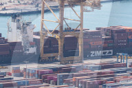The Container Ship Zim Luanda Leaves The Port Of Barcelona.