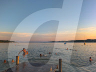 Summer Evening In Water Of Lake