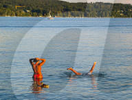 Summer Evening In Water Of Lake