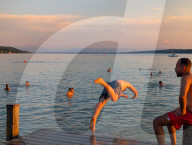 Summer Evening In Water Of Lake