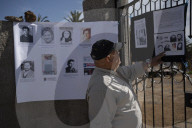 Search persists for priest Michael Woodward thought to be murdered on Pinochet torture ship.