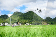 Drones Spraying Pesticides in Anlong