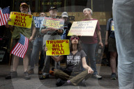 Protesters Denounce Trump's "One Big, Beautiful Bill" In Front Of Trump Tower 