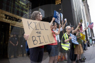 Protesters Denounce Trump's "One Big, Beautiful Bill" In Front Of Trump Tower 