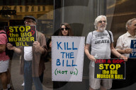 Protesters Denounce Trump's "One Big, Beautiful Bill" In Front Of Trump Tower 