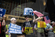 Protesters Denounce Trump's "One Big, Beautiful Bill" In Front Of Trump Tower 