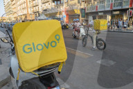 Glovo Couriers In Action On The Street
