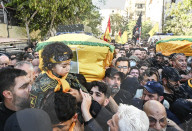 Hezbollah Supporters Mourn in Beirut After Death of Abu Ali Al-Khalil and Son