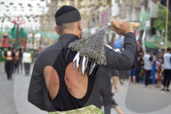 On Thursday Evening, July 3, 2025, Baghdad Commemorates The Seventh Day Of Muharram With A Symbolic Parade Of Imam Abbas, Including Rituals Of The Zanjil And Drums.
