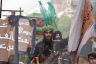 On Thursday Evening, July 3, 2025, Baghdad Commemorates The Seventh Day Of Muharram With A Symbolic Parade Of Imam Abbas, Including Rituals Of The Zanjil And Drums.