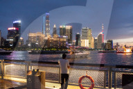 Skyscrapers In Pudong From Yangpu Hafen During Sunset