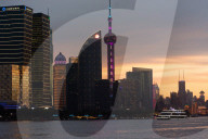 Skyscrapers In Pudong From Yangpu Hafen During Sunset