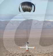 Pilotless glider for delivering front line military supplied