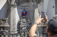 Superman costume on Manneken Pis for film premiere in Brussels, Belgium.