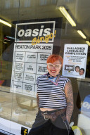 Oasis fever grips Manchester before reunion gigs.