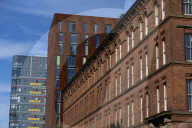 Oasis fever grips Manchester before reunion gigs.