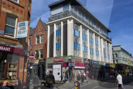 Oasis fever grips Manchester before reunion gigs.
