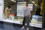 Oasis fever grips Manchester before reunion gigs.