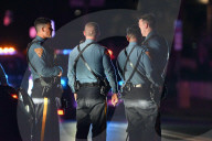 Heavily Armed Law Enforcement Converge On Market Street At Home