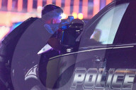 Heavily Armed Law Enforcement Converge On Market Street At Home