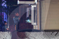 Heavily Armed Law Enforcement Converge On Market Street At Home