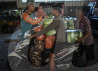 Activities Of Agriculture Traders In A Wholesale Market In Indonesia