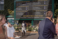 All that white and green: the order and joyous disorder of Wimbledon 2025 – in pictures