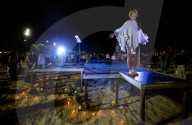 Yoga At Sunrise Draws Hundreds To Copacabana Beach