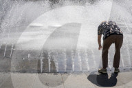 People At Fountain At Karlsplatz Stachus In Munich