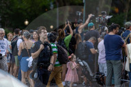Crowds Gather To Watch Manhattanhenge 