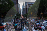 Crowds Gather To Watch Manhattanhenge 