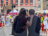 Couple Watching Pride Event