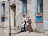 Jehovah’s Witnesses With Literature Cart