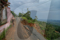 First Day Of School Passing Landslide-affected Road In Jatigede, Indonesia