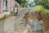 First Day Of School Passing Landslide-affected Road In Jatigede, Indonesia