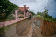 First Day Of School Passing Landslide-affected Road In Jatigede, Indonesia