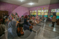 First Day Of School Passing Landslide-affected Road In Jatigede, Indonesia