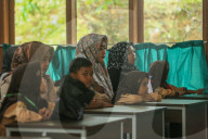 First Day Of School Passing Landslide-affected Road In Jatigede, Indonesia