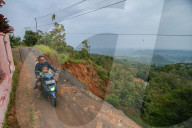 First Day Of School Passing Landslide-affected Road In Jatigede, Indonesia