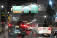 Cars Are At A Standstill As Commuters Make Their Way On The Lower Level Of The George Washington Bridge During Severe Weather