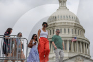 People Walk Past U.S. Capitol