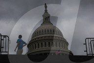 People Walk Past U.S. Capitol