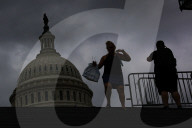 People Walk Past U.S. Capitol