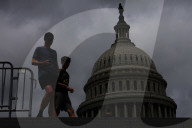 People Walk Past U.S. Capitol