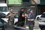 Members Of The United States Marshal Service Regional Fugitive Task Force Gather At The Scene Following The Arrest Of A 62-year-old Man Identified As Audwin Caines On West 142nd Street