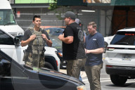 Members Of The United States Marshal Service Regional Fugitive Task Force Gather At The Scene Following The Arrest Of A 62-year-old Man Identified As Audwin Caines On West 142nd Street