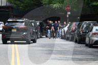 Members Of The United States Marshal Service Regional Fugitive Task Force Gather At The Scene Following The Arrest Of A 62-year-old Man Identified As Audwin Caines On West 142nd Street