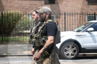 Members Of The United States Marshal Service Regional Fugitive Task Force Gather At The Scene Following The Arrest Of A 62-year-old Man Identified As Audwin Caines On West 142nd Street