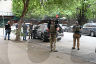 Members Of The United States Marshal Service Regional Fugitive Task Force Gather At The Scene Following The Arrest Of A 62-year-old Man Identified As Audwin Caines On West 142nd Street